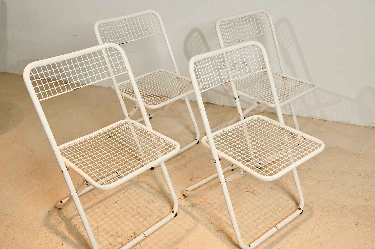 Set de cuatro sillas plegables