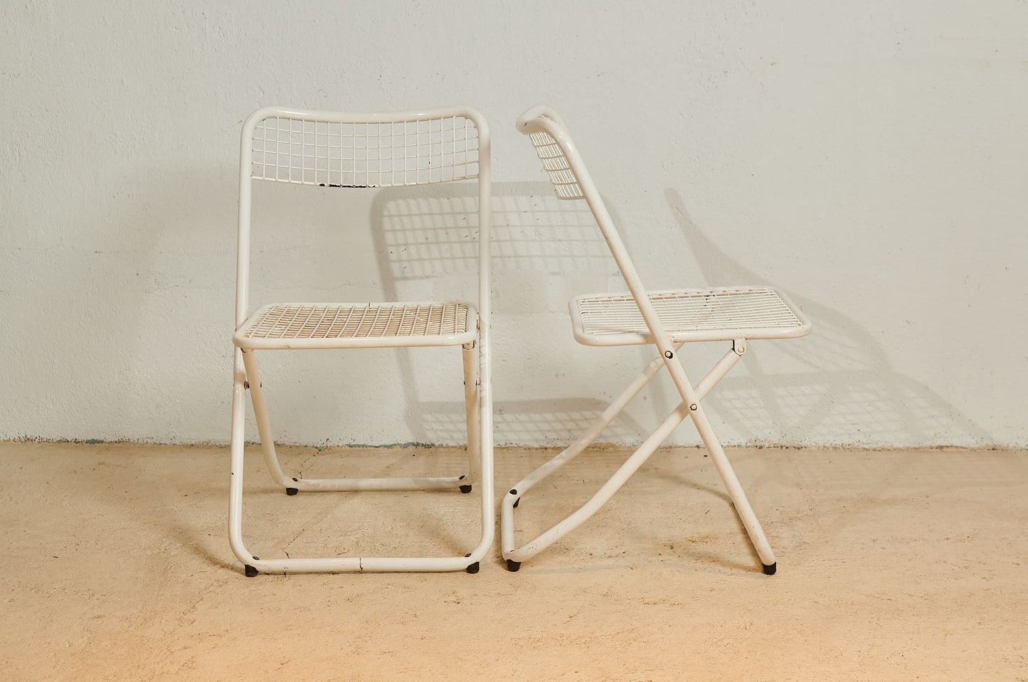 Set de cuatro sillas plegables