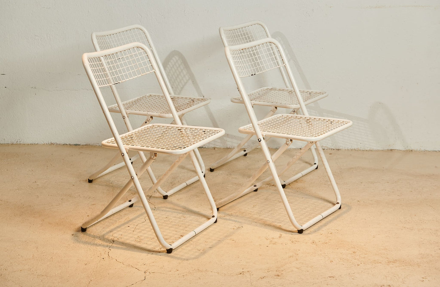 Set de cuatro sillas plegables
